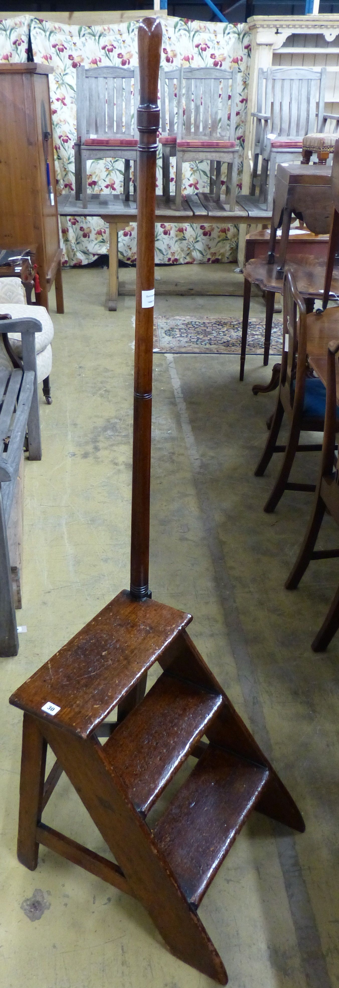 A set of early 19th century mahogany and pine three tread library steps with turned hand rail, W.45cm H.170cm